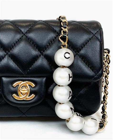 chanel purse pearls|chanel bag with pearl chain.